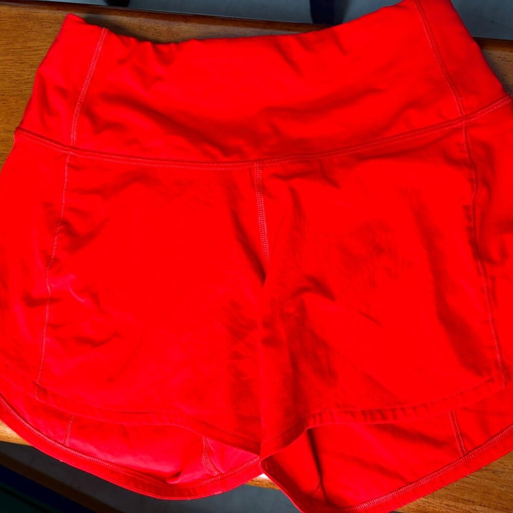 Lulu Lemon red shorts, no size tag, believe they are size 2